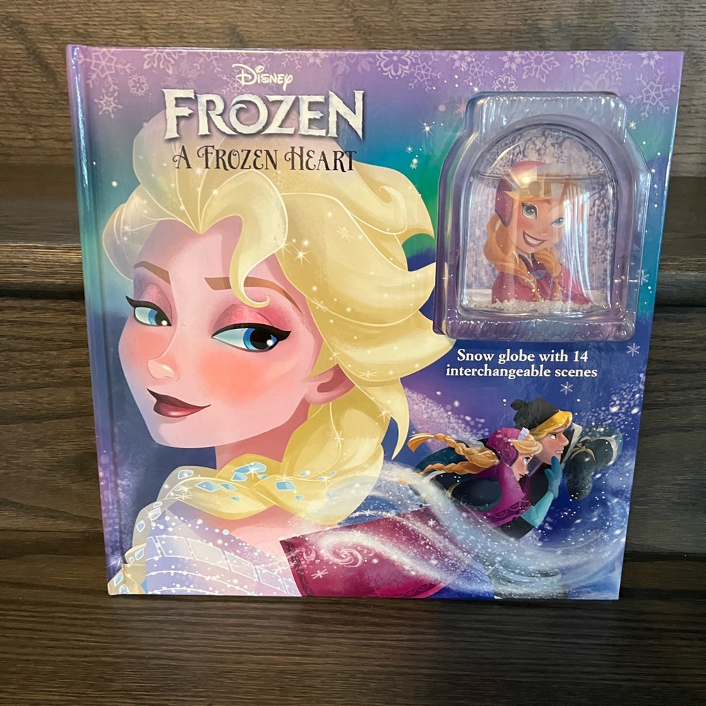 Frozen themed large 11”x11” book with snowglobe